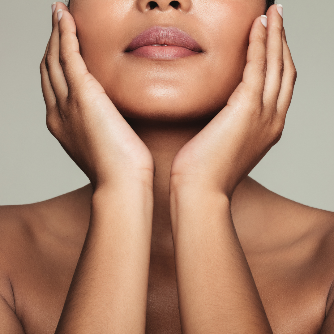 Woman framing her face with her hands